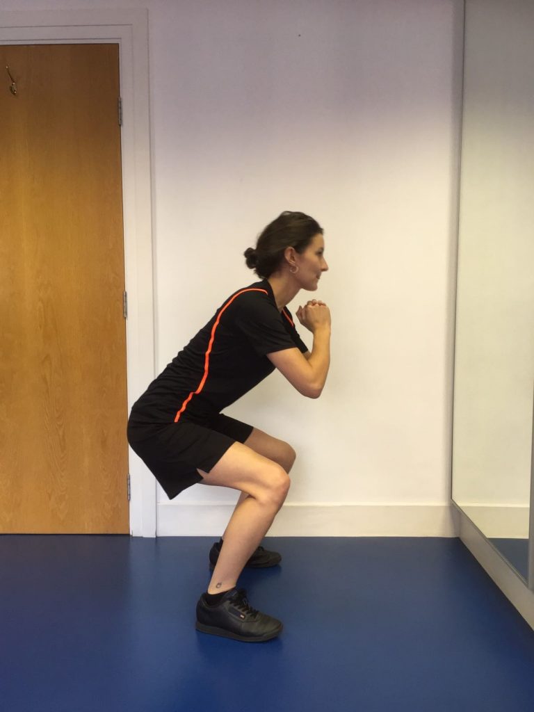 Warming up for football - squats